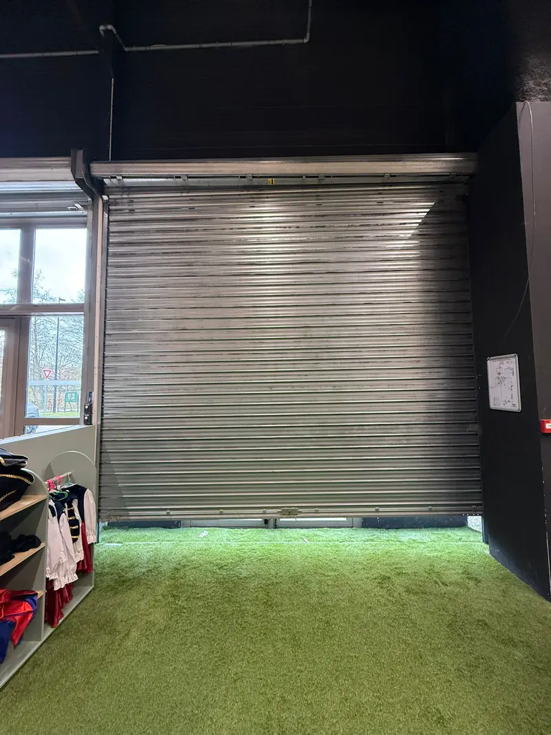 Installation rideau metallique ou porte industrielle